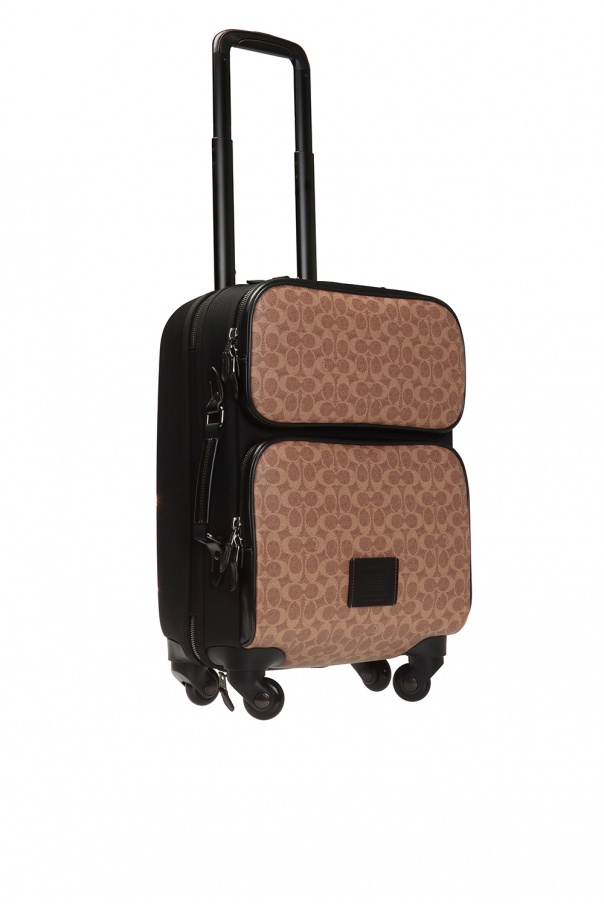 Coach mens carry hot sale on luggage